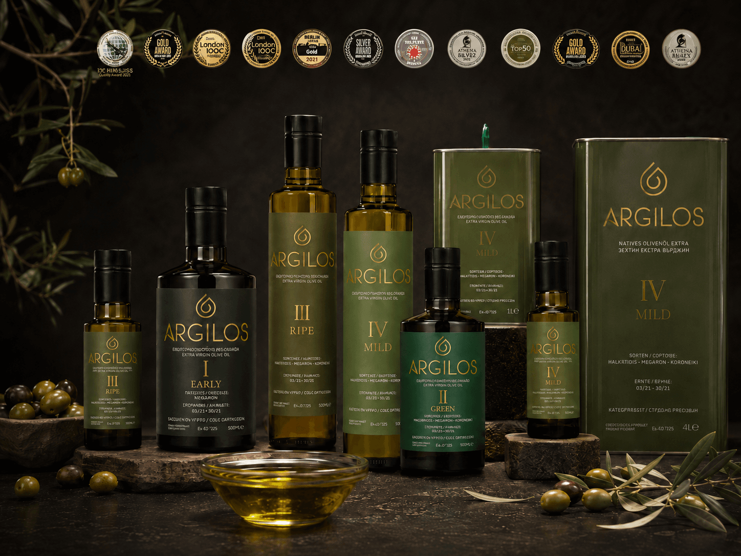Argilos - селекция от бутилки и тинове с четири профила на беритбата, награди, маслини и маслинови клонки.